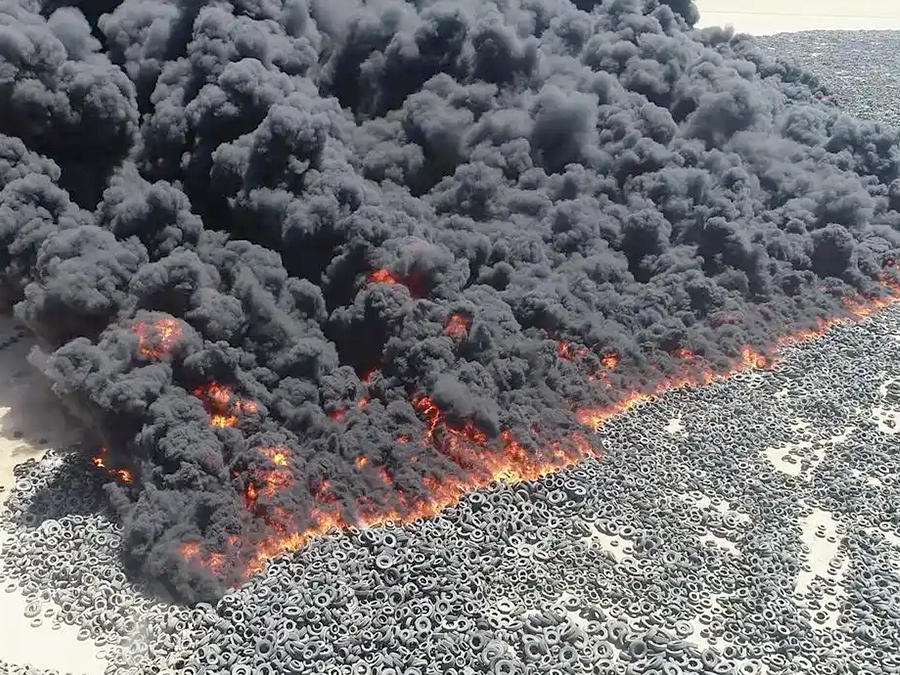 How does burning tires affect the environment?
